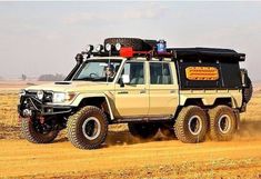 an off road vehicle driving through the desert