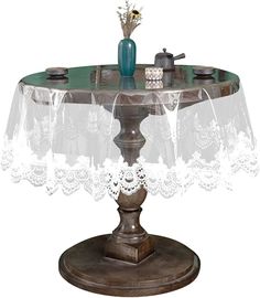 the table is covered with white lace