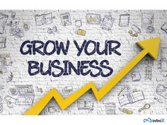 the words grow your business written on a brick wall with an arrow pointing up to it