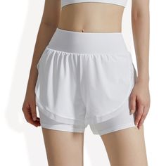 These Anna-Kaci Women's High Waist Layered Athletic Shorts offer a stylish, sporty look perfect for workouts or casual wear. Designed with a high waistband for added support, the shorts feature a breathable mesh lining and layered design for enhanced comfort. The side pockets provide convenient storage for essentials, making them ideal for running errands or hitting the gym. Crafted from lightweight, moisture-wicking fabric, these shorts keep you cool and comfortable during any activity. Bottom Workout, Athletic Skort, Woman Weaving, Layered Design, Tennis Skirt, Sporty Look, Athletic Fits, Bottom Clothes, Layers Design