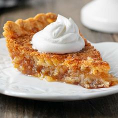 a piece of pie with whipped cream on top