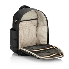 Built for those with their head in the clouds and their feet (usually running around) on the ground, our Midnight puffer style diaper backpack makes a total statement while balancing form and function. The lightweight and airy construction is made for those looking to grab and go, while the laidback and luxe design effortlessly creates a major style moment Take this baby anywhere, with 14 roomy pockets, comfy padded shoulder straps, and endless eye-catching touches—including sleek brushed metal Luxe Design, Itzy Ritzy, Stroller Straps, Head In The Clouds, Inside Bag, Convertible Bags, Diaper Bag Backpack, In The Clouds, Bottle Bag