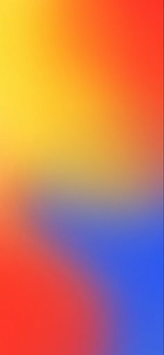 an abstract blurry background in red, yellow and blue