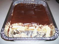 a pan filled with chocolate cake sitting on top of a counter