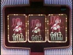 an old fashioned slot machine with three different symbols on it