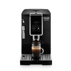 an espresso machine with coffee in it on a white background, viewed from the side