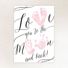 a pink hand and foot print with the words love you to the moon and back