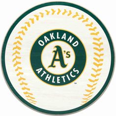 the oakland athletics logo is shown in green and yellow on a white baseball ball with an orange stitching around it