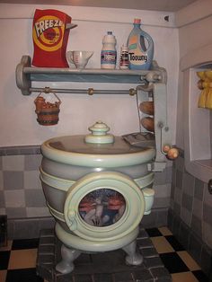 an old fashioned toilet in a small bathroom