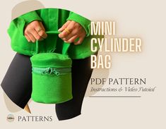 a woman holding a green bag with the words mini cylinder bag on it and instructions to sew