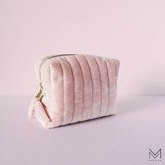 Introducing our elegantly handcrafted quilted cosmetic bag, a perfect fusion of style and practicality. Made from high-quality velour fabric, each bag showcases intricate quilted patterns that elevate its elegance and sophistication. This makeup bag is roomy enough to accommodate your makeup essentials, brushes, and personal care items without sacrificing style. Designed by me, our large and medium sizes feature inner pockets for added convenience. The gold zippers make it visually appealing and Handmade Cosmetics, Elegant Makeup, Velour Fabric, Toiletry Storage, Chic Accessories, Cosmetic Pouch, Makeup Essentials, Gold Zipper, Perfect Gift For Her