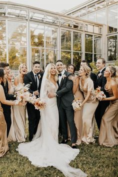 a bride and groom with their bridal party