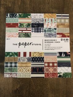 the paper studio coupon is displayed on a wooden table with various patterns and colors