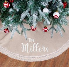 a christmas tree skirt that says the millers on it