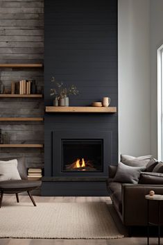 a living room filled with furniture and a fire place in the middle of the room