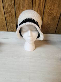 This hat is handmade by me. Acrylic yarn, in cute style. I can customize to your favorite color. Center accent may be different depending on availability. Ships in 2-3 weeks. I do not refund for buyers remorse. I do not ship internationally. Trendy White Winter Bucket Hat, Trendy White Brimmed Bucket Hat, Casual White Crochet Hat For Winter, White Wide Brim Crochet Hat, Handmade White Crochet Beanie Hat, White Trendy Crochet Hat For Winter, Handmade White Crochet Bucket Hat, Handmade White Crochet Hat With Curved Brim, Adjustable White Crochet Bucket Hat