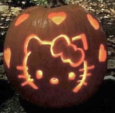 a hello kitty pumpkin carved into the shape of a cat