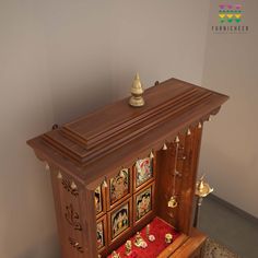 an ornate wooden shrine with bells and decorations