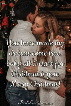 a couple kissing in front of a christmas tree with the words you have made my dreams come true, baby all i want for christmas is you merry christmas