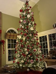 a decorated christmas tree in a living room