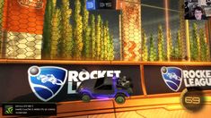 an image of a car driving on the road in front of a rocket league sign