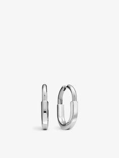 From opening its doors in 1837 until the 50s, Tiffany & Co. engineered functional padlocks, but the latest iteration comes in the form of the gleaming Tiffany Lock earrings. A far cry from the jeweller's robust archival designs, these hoops come with sleek, fluid lines symbolic of inclusivity and togetherness. The pair features rhodium-plated 18-carat white gold, with no fuss or frills to disturb the minimalistic aesthetic. Lock Earrings, White Gold Hoop Earrings, Minimalistic Aesthetic, Honey Oil, White Gold Hoops, Advent Calendars For Kids, Wine Case, Far Cry, Bridal Shoes Flats