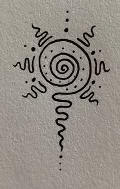 a drawing on the wall that has been drawn in black ink with an image of a spiral