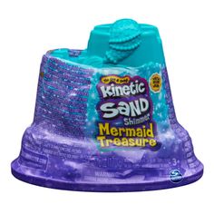 a purple and blue plastic sand toy on top of a white background with the words, mermaid