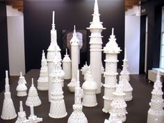 a large group of white lego model buildings