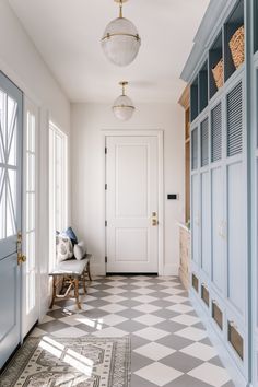 the hallway is clean and ready to be used as a dressing room or sitting area