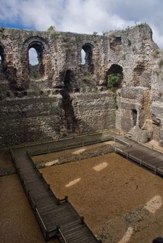 the inside of an old building with stairs leading up to it