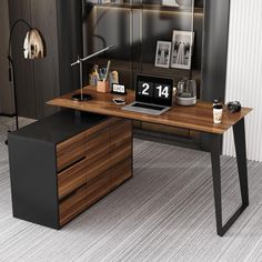 a desk with a laptop on top of it