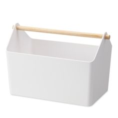 a white box with a wooden handle on the top and bottom, sitting against a white background