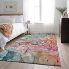 a bedroom with a large rug on the floor