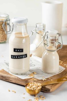 oatmeal in a glass bottle next to other ingredients on a cutting board