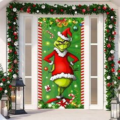 the grinch door cover is decorated with christmas decorations