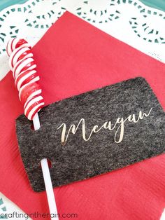 a close up of a candy bar on a table with red and white napkins