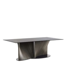 a black table with an unusual design on the top and bottom, in front of a white background