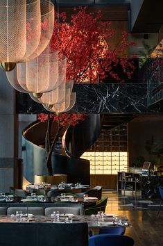 the dining room is decorated with chandeliers and tables