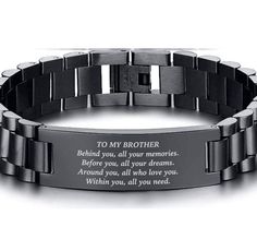 a stainless steel bracelet with an engraved message on the front and back of it's clasp