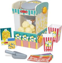 a play food set with popcorn and other items