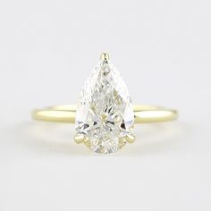 2 Carat Pear Cut Hidden Halo Engagement Ring Moissanite Engagement Ring Solitaire, Types Of Diamonds, Halo Setting, Sparkling Diamond, Diamond Anniversary, Hidden Halo, Round Moissanite, Diamond Solitaire Engagement Ring, Ring Sizes