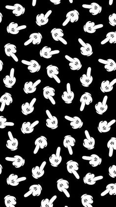 the mickey mouse pattern is black and white with lots of small hands pointing at it