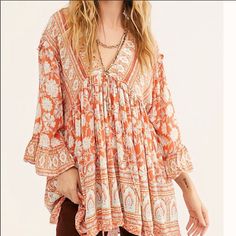 Brand New Just Bought This Last Month! Took The Tags Off But Never Wore It Orange Long Sleeve Boho Dress With Print, Orange Long Sleeve Boho Dress, Orange Long Sleeve Bohemian Dress, Summer Long Sleeve Orange Boho Dress, Orange Long Sleeve Boho Dress For Summer, Bohemian Mini Length Tops For Beach, Orange Long Sleeve Boho Dress For Beach, Bohemian Apricot Dress With Floral Print, Flowy Orange Boho Dress