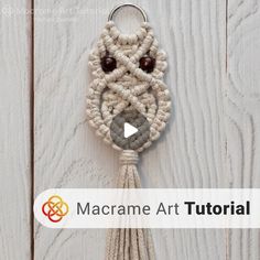 the macrame art keychain is hanging on a white wooden wall with text overlay that reads macrame art