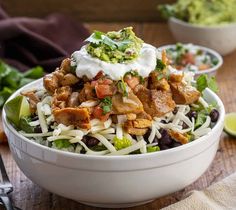 a white bowl filled with mexican chicken salad