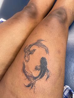 a person with a tattoo on their leg