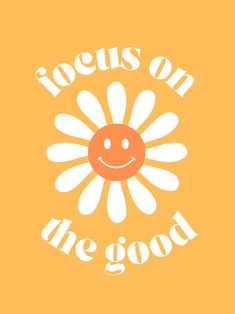 an orange and white flower with the words focus on the good