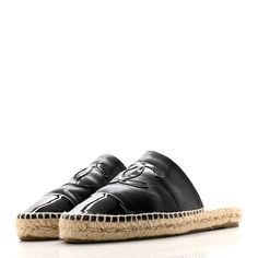 This is an authentic CHANEL Goatskin Patent Calfskin CC Espadrille Mules size 40 in Black. These lovely espadrille shoes are crafted of soft goatskin leather in black with black patent calfskin toe caps, and aChanel CC patch and beige espadrilles. Beige Espadrilles, Espadrille Shoes, Calf Skin, Espadrilles, Chanel, Leather, Black