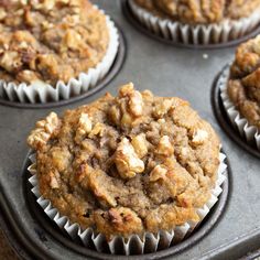 several muffins are sitting on a baking pan